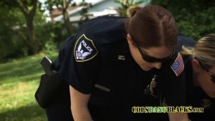 Milf cops take turns to please themselves with Skinny D's cock