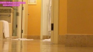 unaware MILF caught on hotel bathroom hidden cam