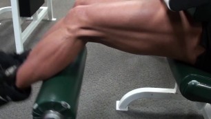 IFBB Pro FBB LDR does Leg Extensions at the Gym
