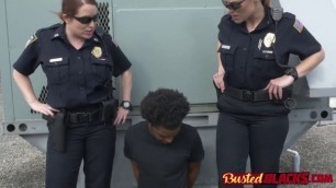 Redhead cop sucks a big black cock in front of her horny partner that is waiting to fuck it hard.
