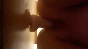 BBW fucks suction cup dildo