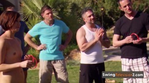 Swingers play dildo bash with a frisbee daring each other