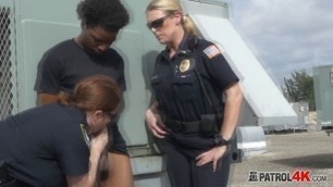 Busty cops found a big black cock in the street to gag deep.
