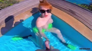 Horny redhead MILF fucks herself in the pool, until cock arrives!