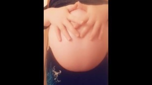 Big swollen pregnant belly with a beautiful princess inside