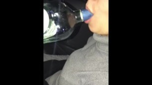 Sucking the bottle in car