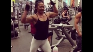 Asian Milf FBB shoulders exercising